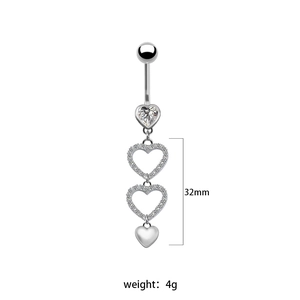 Detail view of heart-shaped belly ring with 32mm length and 4g weight specifications