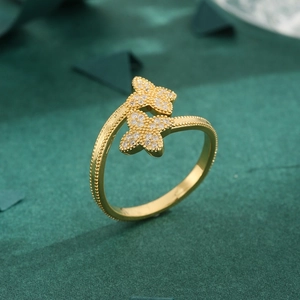 Elegant gold-plated open ring with sparkling cubic zirconia double butterflies and beaded edge