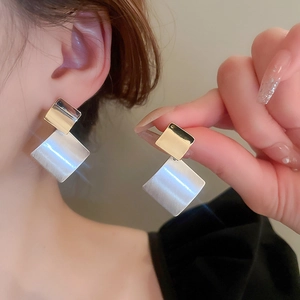 Minimalist geometric square drop earrings with gold hooks and brushed silver finish