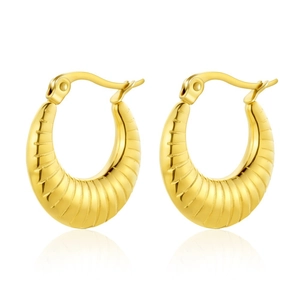 Textured gold U-shaped hoop earrings with geometric pattern on white background