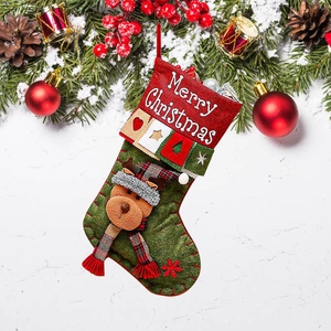 Green Christmas stocking with 3D reindeer decor and Merry Christmas embroidery