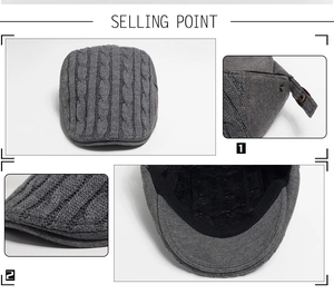Detail view of charcoal gray knit beret featuring cable weave and metal adjustment buckle