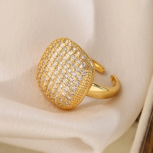 Luxurious gold-tone adjustable ring with cushion-cut surface pave-set in cubic zirconia