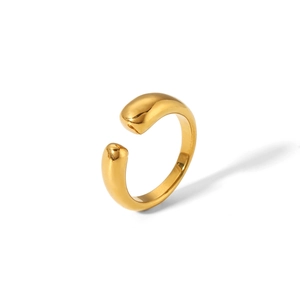 Detail view of waterdrop-shaped gold plated stainless steel ring with mirror finish