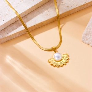 Golden stainless steel snake chain necklace featuring a vintage leaf pearl sun pendant