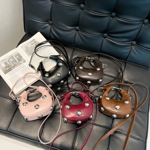 Mini semi-circle faux leather crossbody bags with silver rivets in five assorted colors