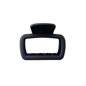 Matte black rectangular hair claw clip for women's hairstyle with sleek minimalist design