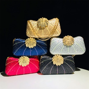 Detailed arrangement of luxury rhinestone evening bags in gold, blue, silver, rose and black