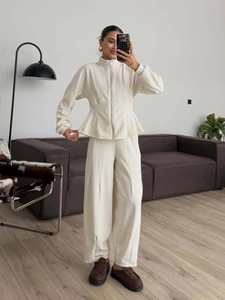 Women's cream white two-piece lounge set with zip jacket and wide-leg trousers