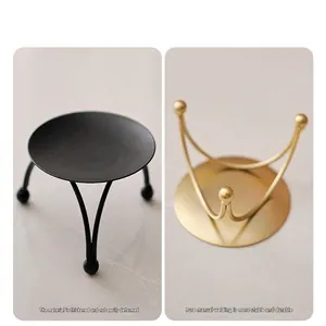 European style gold and black metal candle trays with stable three-legged support bases