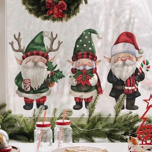 Three festive Christmas gnome window stickers featuring reindeer antlers and holiday candy