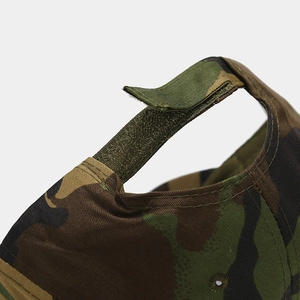 Camouflage baseball cap featuring forest pattern and adjustable velcro strap closure