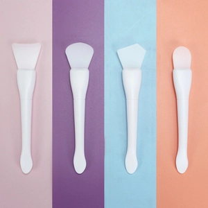 Dual-head silicone face mask brushes with fishtail scoop design in various brush head shapes