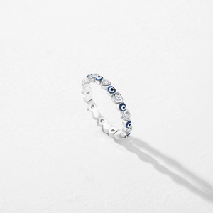 Elegant S925 sterling silver ring featuring blue enamel evil eyes and sparkling hearts