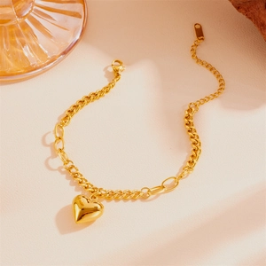Bracelet à breloque coeur en or poli avec chaîne réglable et fermoir mousqueton