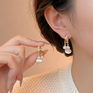 Elegant gold cat eye stone gourd earrings with pearl accents and zircon hoop detail