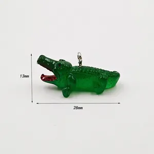 Detailed view of a 28mm green acrylic crocodile pendant with precise size dimensions