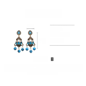 Detail showing dimensions of retro tassel earrings with blue stones and alloy frame
