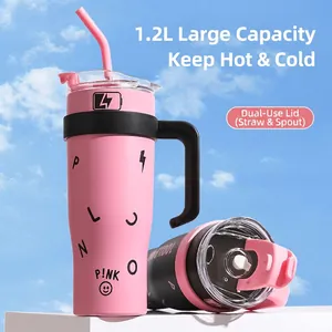 Black and pink 40oz insulated tumbler with 1.2L capacity, handle, and straw for cars