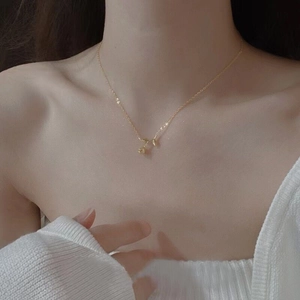 Elegant gold S925 sterling silver rose flower pendant necklace worn by a woman