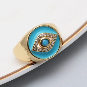 Gold-plated Evil Eye open ring with blue enamel and sparkling crystal pavé details