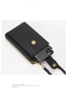 Close-up of black lychee grain leather crossbody phone bag with gold metal hardware