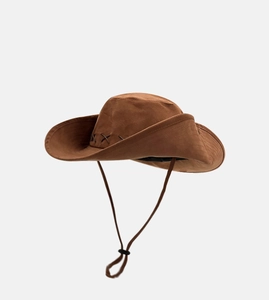 Detail of brown cowboy sun hat featuring vintage cross stitching and adjustable chin strap