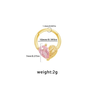 Detailed view of 1.2mm gold heart nose ring with pink zircon and wing design