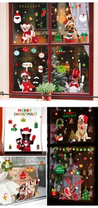 Détail de stickers de Noël pour vitres avec chiens festifs et flocons de neige