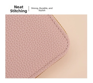 Close-up of pink litchi grain leather texture and durable neat stitching details