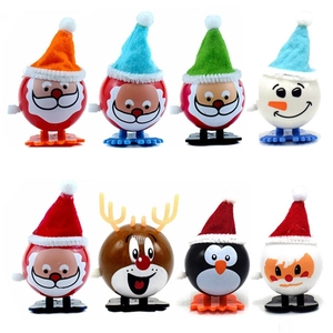Set of 8 wind-up Christmas toys featuring Santa Claus, reindeer, penguin and snowman