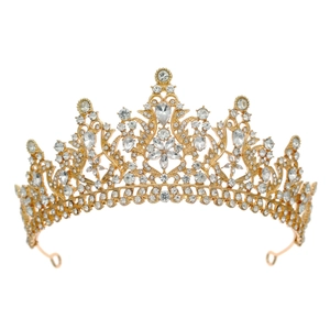 Detailed view of luxury gold alloy crown encrusted with clear rhinestones for bridal wear