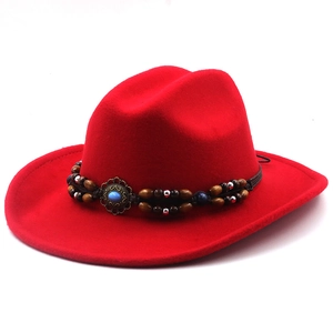Detail of red wool felt fedora with a beaded woven leather band and turquoise stone