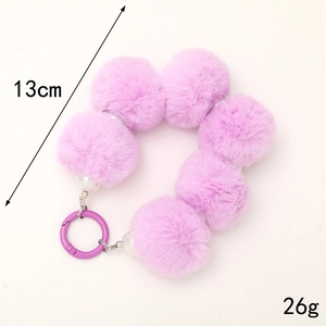 Purple faux fur pompom beaded wrist strap for phones and bags, 13cm length