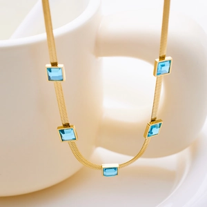 18k gold plated flat snake chain necklace with five square light blue zircon stones