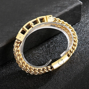 Close-up of gold double-row stainless steel chain bracelet with C-letter magnetic clasp