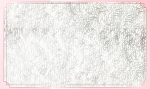 Macro shot of cotton texture on white facial massage set towel showing soft fiber loops