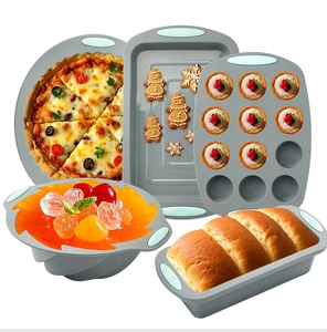 Gray silicone baking pans set with blue handles including muffin tin and toast mold
