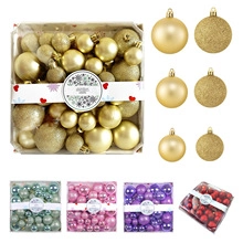 Detail of multi-finish Christmas ball set with glossy matte and glitter textures