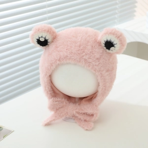Detailed view of pink plush frog hat for toddlers with cute bow tie and soft inner lining