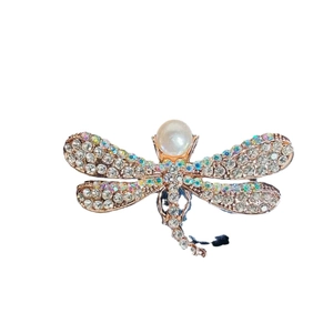 Elegant golden dragonfly brooch with sparkling rhinestones and white pearl accent
