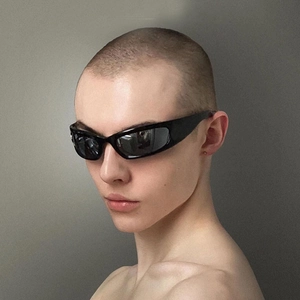 Close-up of wrap-around sports sunglasses with silver reflective lenses and black frames