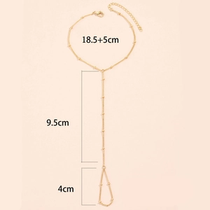 Detailed view of gold star butterfly ring bracelet showing 18.5cm and 9.5cm dimensions