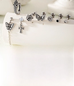 Detailed specs of titanium steel stud earrings set featuring vintage silver motifs