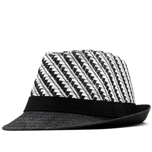 Men's summer straw fedora hat featuring black and white geometric weave and black ribbon band