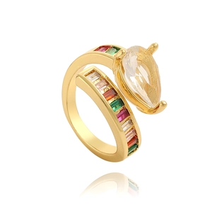Detailed macro view of gold adjustable ring with teardrop zircon and multicolor gems