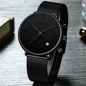 Macro shot of Geneva men's watch featuring black mesh strap and date display window