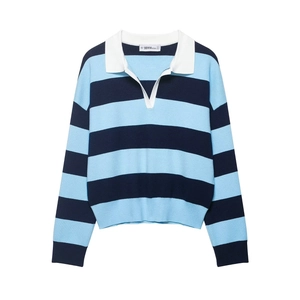 Close-up of the striped knit polo shirt with white collar and deep V-neckline detail