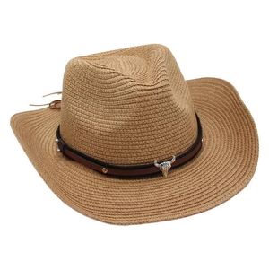 Detail of straw cowboy hat featuring a leather band with a silver metal bull head ornament