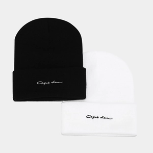 Knitted beanie set in black and white with Carpe Diem embroidery in a minimalist style